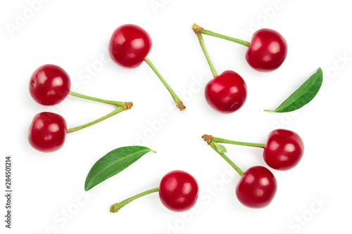 Some cherries with leaf closeup isolated on white background. Top view. Flat lay.