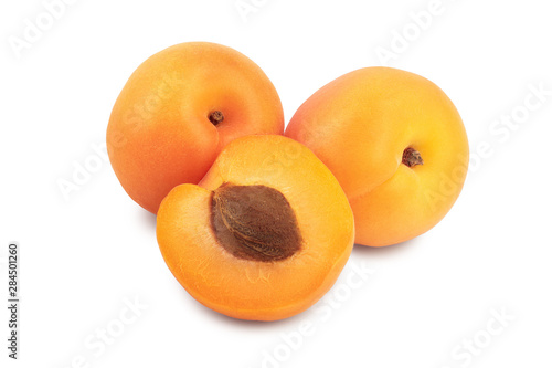 Apricot fruit with half isolated on white background macro
