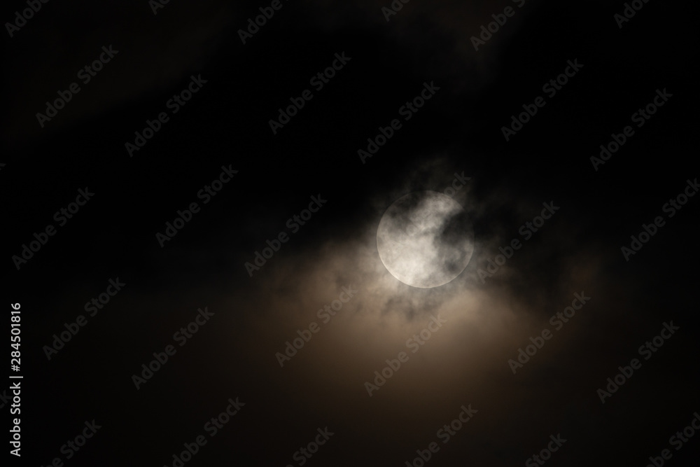 Moon light behind cloud Moon light behind cloud