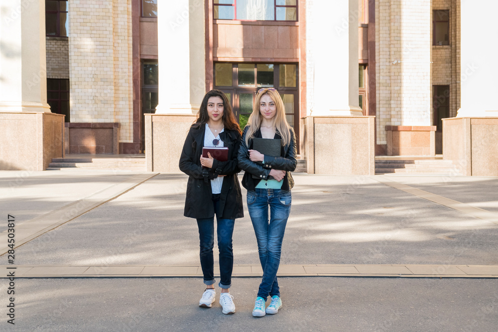 portrait of two women at the university