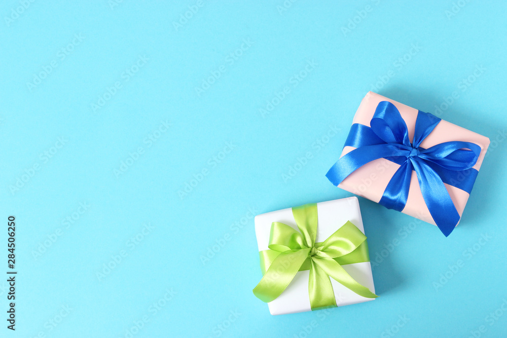 gifts on a colored background top view. Holiday, giving presents, birthday. gifts on a colored background top view. Holiday, giving presents, birthday.