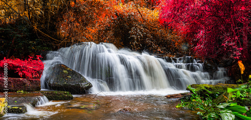 Fototapeta Naklejka Na Ścianę i Meble -  Exotic waterfall and lake landscape panoramic beautiful waterfall in rainforest at Mundang waterfall national park, Phu thap boek, Thailand.