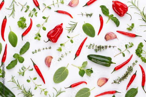 Wallpaper Mural Spice herbal leaves and chili pepper on white background. Vegetables pattern. Floral and vegetables on white background. Top view, flat lay. Torontodigital.ca
