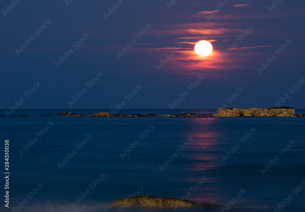 Shining Moon rise with reflection Shining Moon rise with reflection