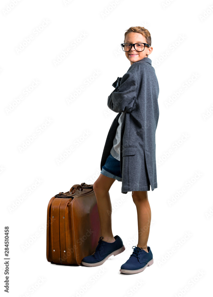 Little boy with his father's clothes playing to be adult with his arms crossed on isolated white background Little boy with his father's clothes playing to be adult with his arms crossed on isolated white background