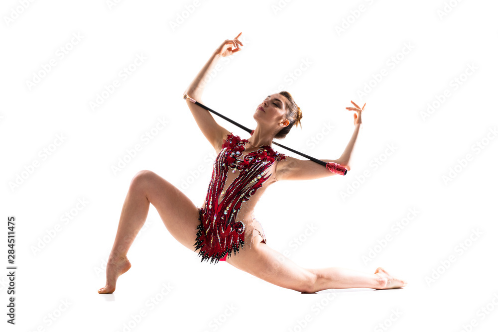 Obraz premium Girl doing rhythmic gymnastics with maces.
