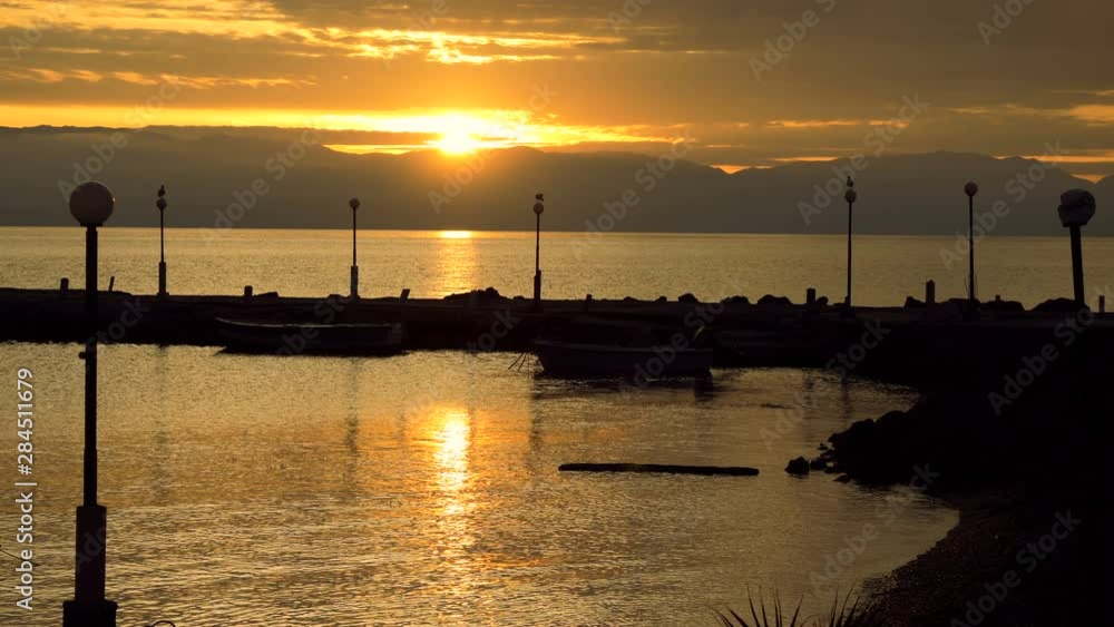 The sun is rising over the Mediterranean sea at dawn in Greece. 4K The sun is rising over the Mediterranean sea at dawn in Greece. 4K