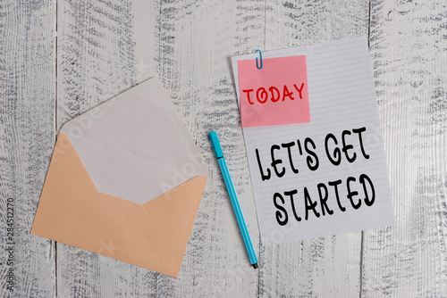 Writing note showing Let S Is Get Started. Business concept for to begin doing or working on something you had started Envelope blank sheet sticky note ballpoint wooden background