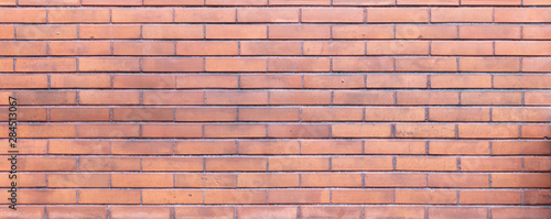 Brown red color brick wall texture, background.