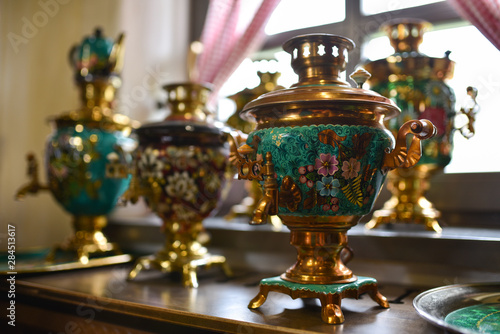 Old Russian samovar stands at the window