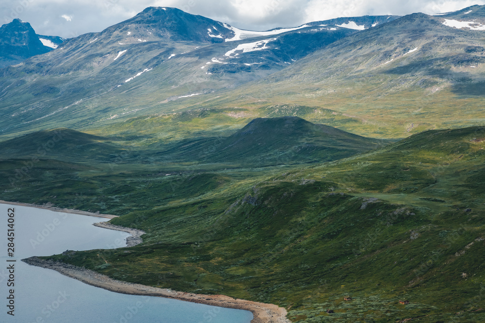 Summer scenery in Jotunheimen national park in Norway, mountains and lake