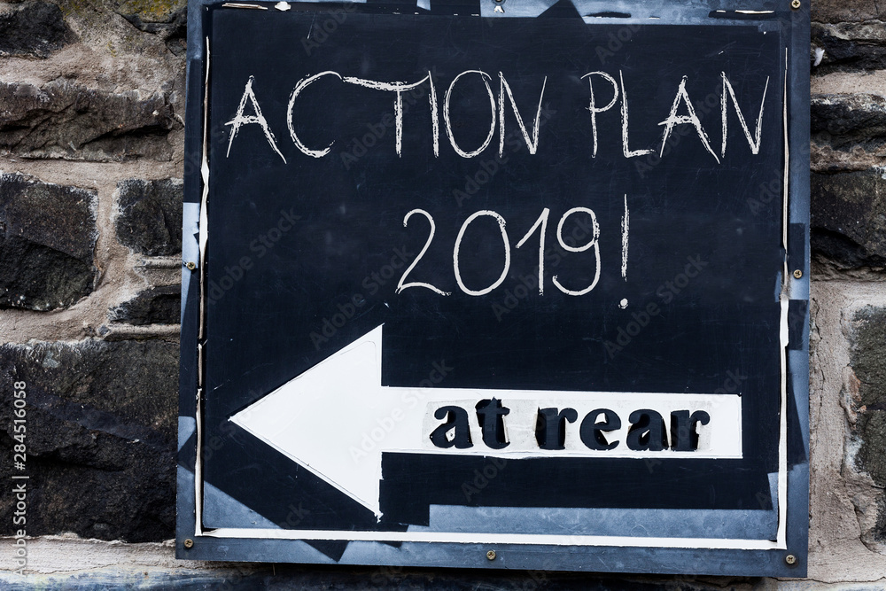 Fototapeta Word writing text Action Plan 2019. Business photo showcasing proposed strategy or course of actions for current year Advertisement concept with empty copy space on the road sign
