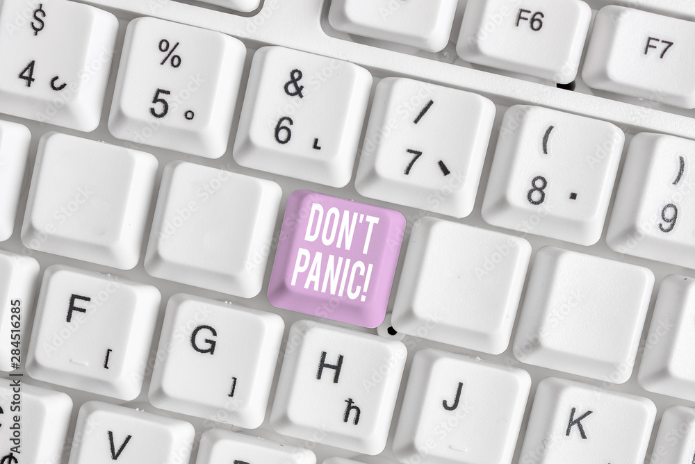 Word writing text Don T Panic. Business photo showcasing suddenly feel so worried or frightened that you can not behave White pc keyboard with empty note paper above white background key copy space Word writing text Don T Panic. Business photo showcasing suddenly feel so worried or frightened that you can not behave White pc keyboard with empty note paper above white background key copy space