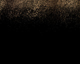 Gold glitter texture isolated on black background. Golden explosion of confetti. Holiday background. 
