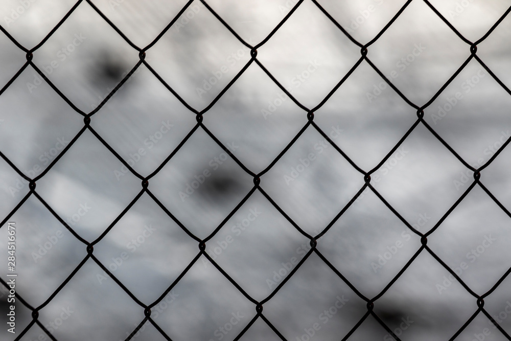 Fototapeta premium chain link fence on a background