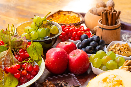 Berries and leaves of viburnum, sea buckthorn, pumpkin, walnut, red apple, cinnamon and anise. Autumn vitamins to strengthen the immune system.