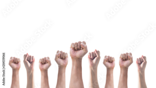 Hands with clenched fist of people crowd (men and women) isolated on a white background with clipping path for social justice and human rights concept photo