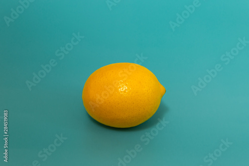 yellow lemon on blue background