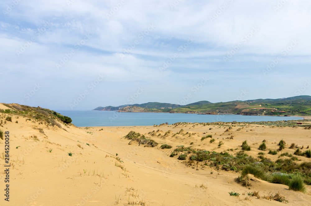 Amazing scenery by the sea in Lemnos island, Greece, with sand dunes Amazing scenery by the sea in Lemnos island, Greece, with sand dunes