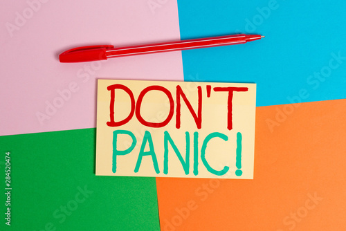 Conceptual hand writing showing Don T Panic. Concept meaning suddenly feel so worried or frightened that you can not behave Office appliance square desk study supplies paper sticker