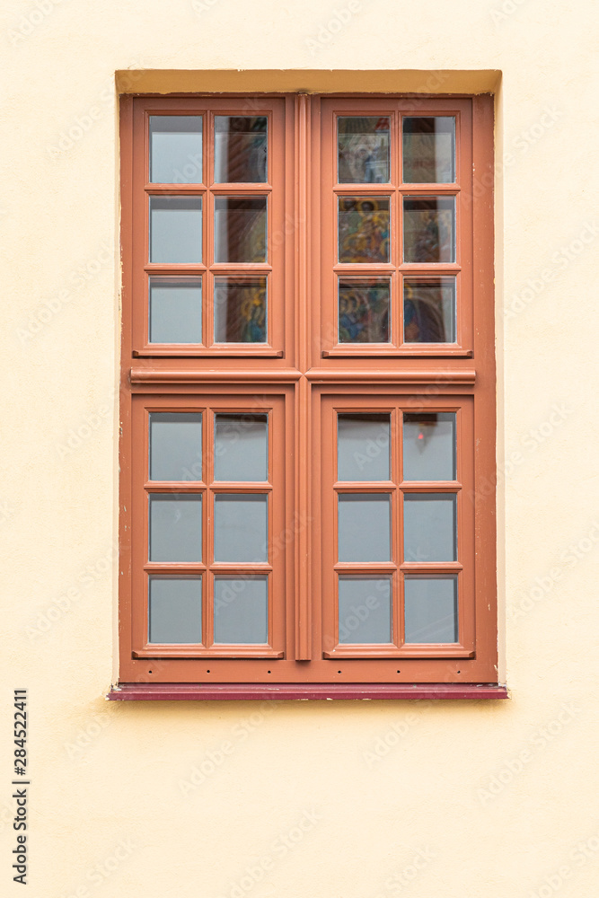 Close-up of wooden window of church
