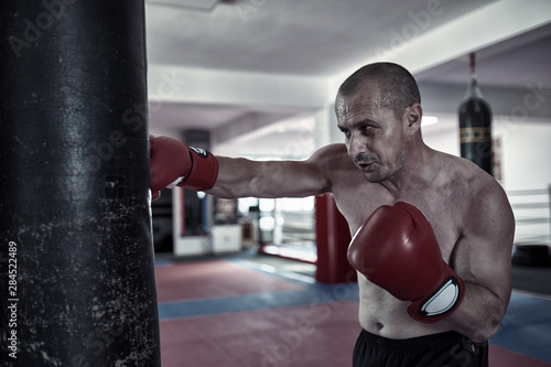 Boxer training at heavy bag