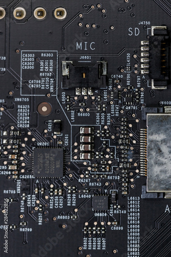 Close up of an electric circuit board. Microelectronics engineering technology