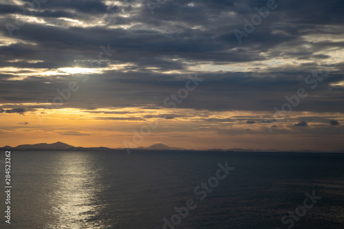 Sunset sea and mountain