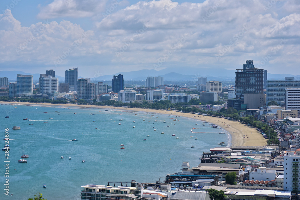 Naklejka premium Look from the high, see the city in the city that is full of tall buildings and the sea. Beautiful, comfortable view