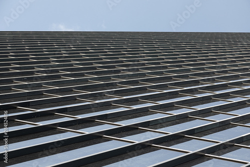 Angular shot of glass building wall panels