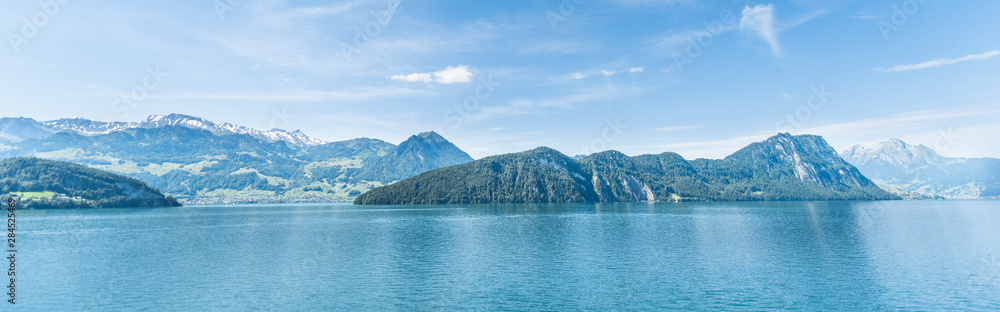 Panorama of the lake and mountains of the Alps in Switzerland.