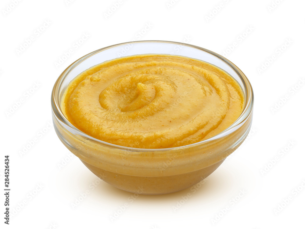 Mustard sauce in bowl isolated on white background Mustard sauce in bowl isolated on white background