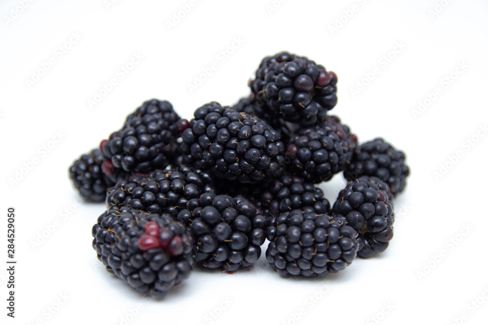 Boysenberry isolated on a white background. Boysenberry isolated on a white background.