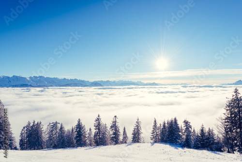  Winter sun on a blue sky. Alps