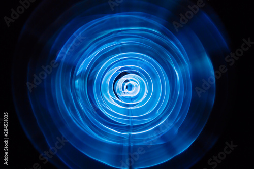 Sound waves in the dark. Blue color