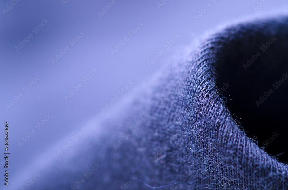 Fototapeta premium Blue textile material fabric blur background macro