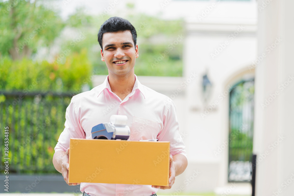 delivery ideas concept indian messenger handle package product to customer with happiness and cheerful house door entrance delivery ideas concept indian messenger handle package product to customer with happiness and cheerful house door entrance