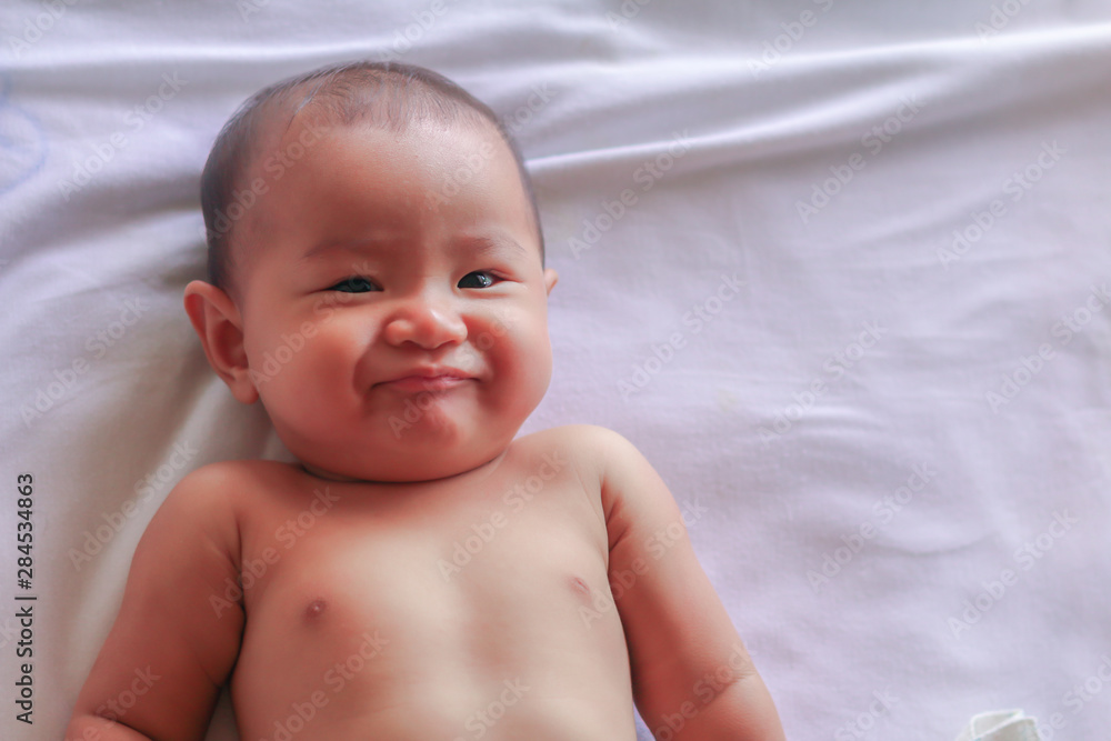 asian baby girl in bed room asian baby girl in bed room