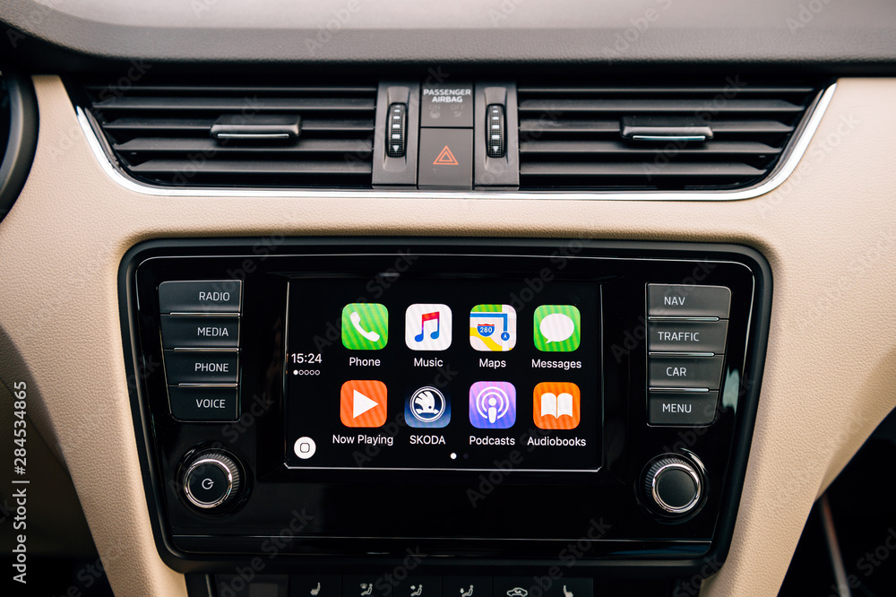 PARIS, FRANCE - DEC 13, 2016: Apple CarPlay main screen in modern car  dashboard. CarPlay is an