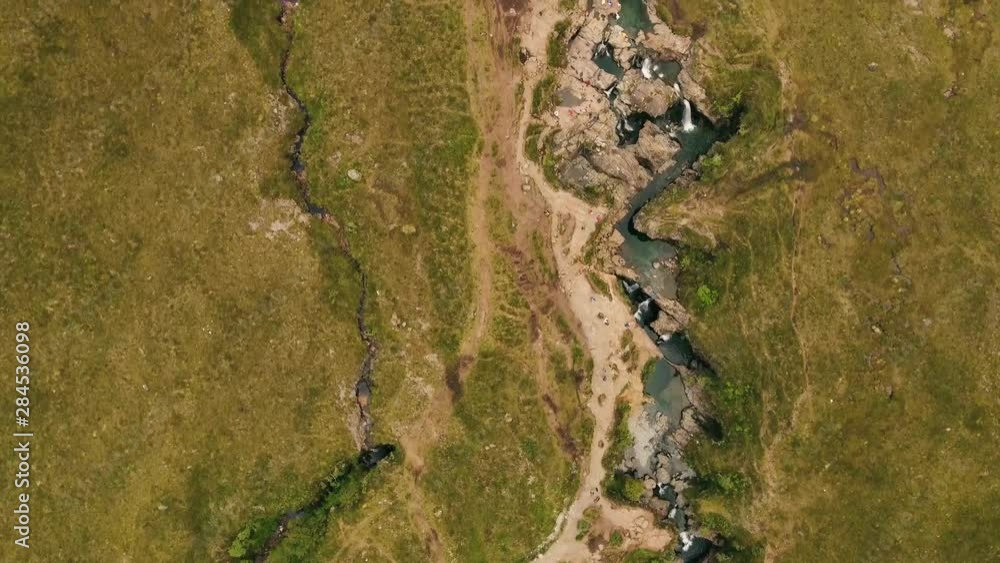 Aerial view on fairy pools, waterfalls, clear water on Isle of Skye, Scotland Aerial view on fairy pools, waterfalls, clear water on Isle of Skye, Scotland