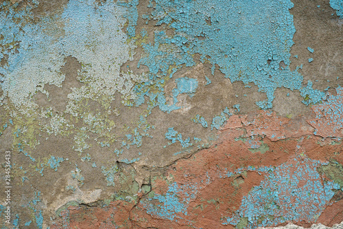 texture of a concrete wall with peeling paint