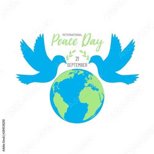 International peace day with doves, olive branches and earth