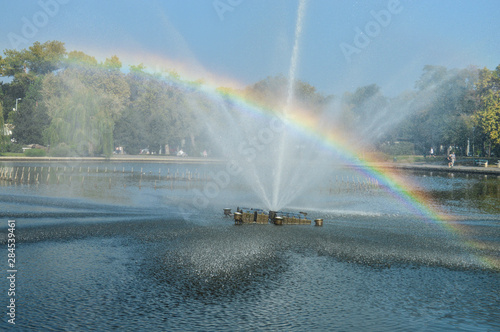 Rainbow in the fountain park nature 