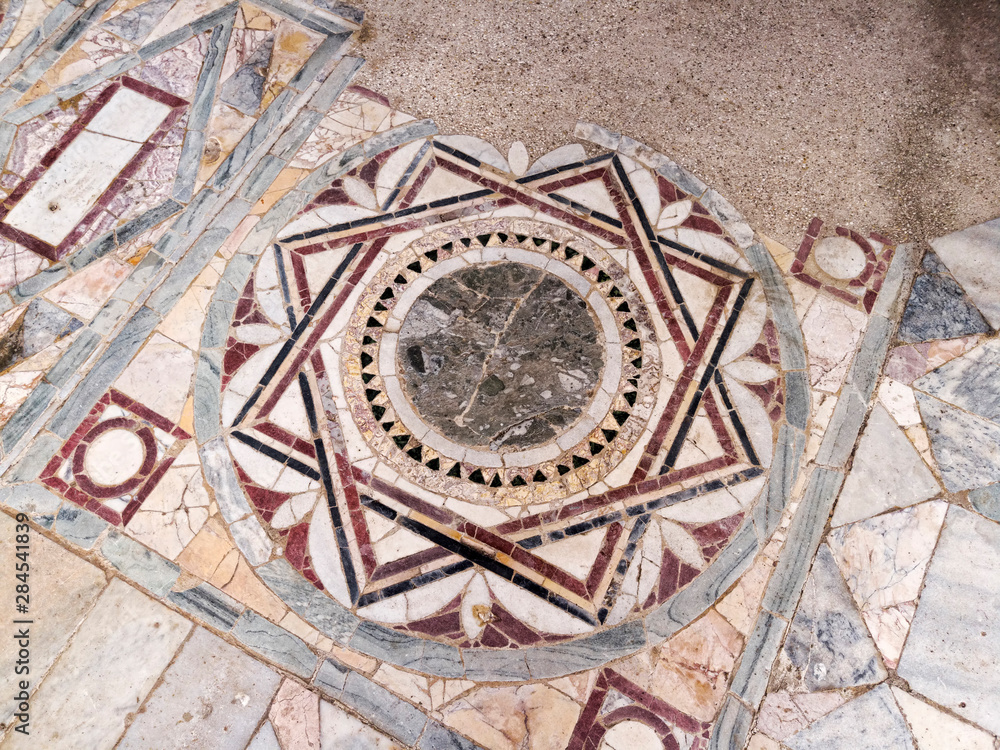 Detail of the polychrome opus sectile of the room with the three-light window in the Domus of Nymphaeum in Ostia Antica, Rome