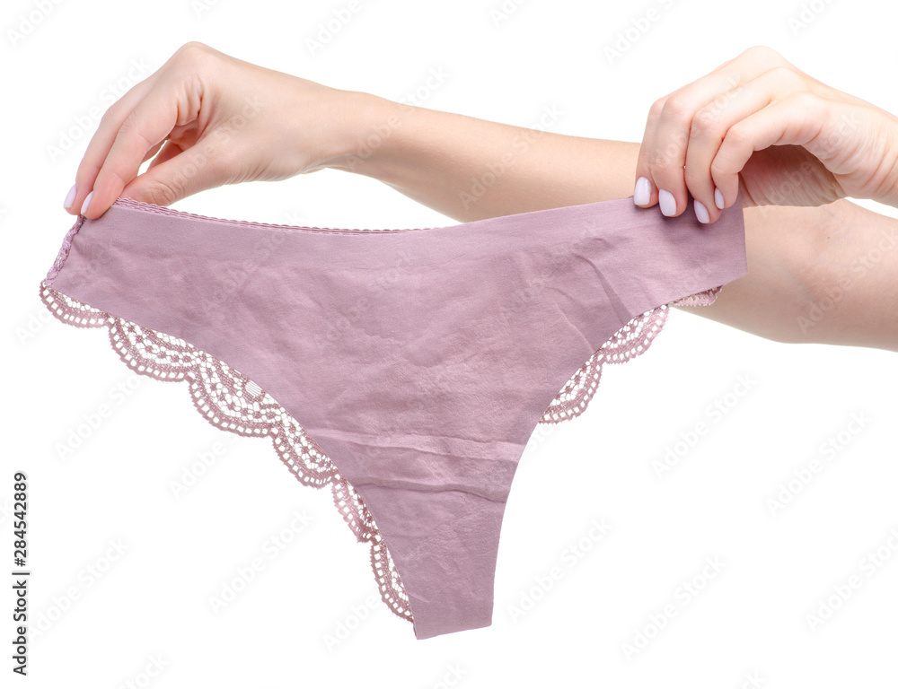 Female pink lace panties in hand Female pink lace panties in hand