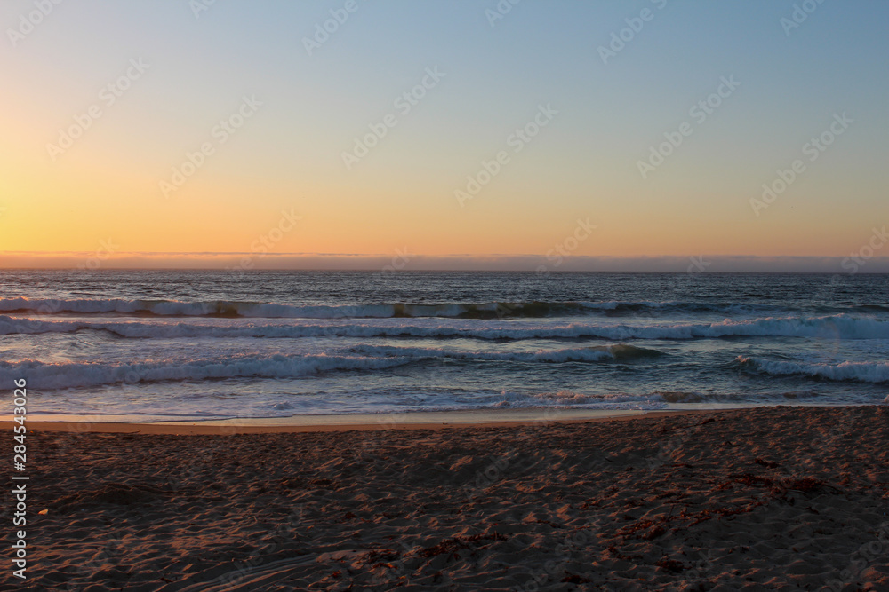 Sunset view from beach in Sand City, California, USA