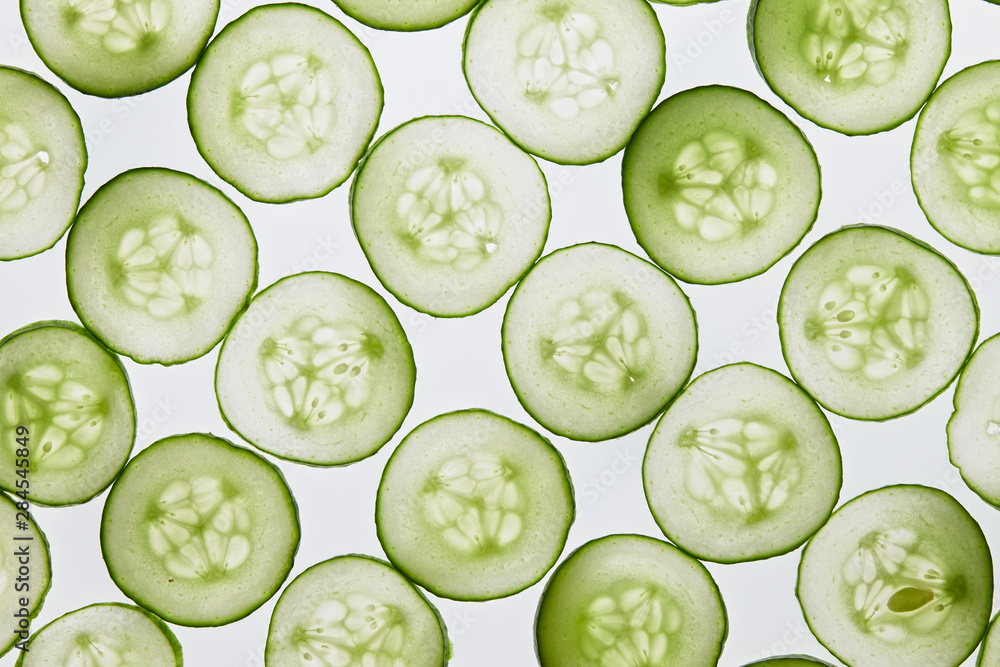 Fresh cucumber slices on a white background Fresh cucumber slices on a white background