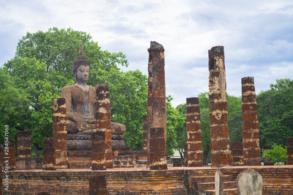 Beautiful ancient buddha at Sukhothai Historical Park ,Sukhothai ,Thailand