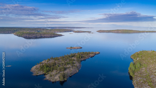 Russia. Karelia. Islands in lake Ladoga. The Landscape Of Russia. View of the lake from the drone. Karelian skerries. Northern nature.