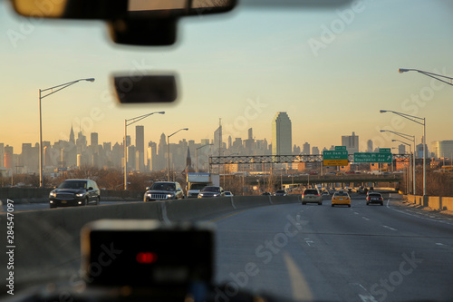 Beautiful view on the skyline of New York City as seen from the inside of a cab